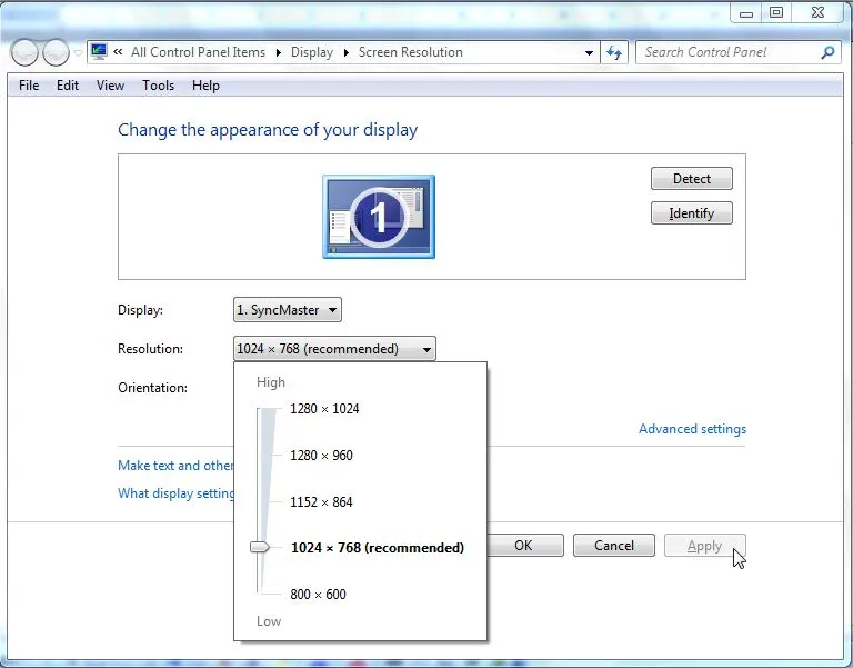 Giao diện cài đặt Display Settings trên Windows XP, minh họa thao tác chọn và kéo thanh trượt độ phân giải màn hình.