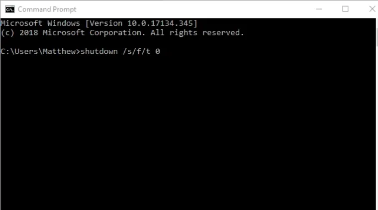 Cửa sổ Command Prompt (CMD) đang hiển thị lệnh shutdown /s /f /t 0 để tắt nguồn máy tính bằng cưỡng bức.