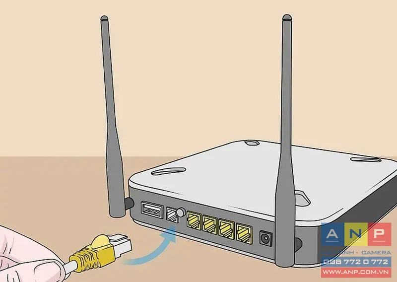 Cắm cáp Ethernet từ modem vào cổng WAN của bộ định tuyến để phân phối Internet