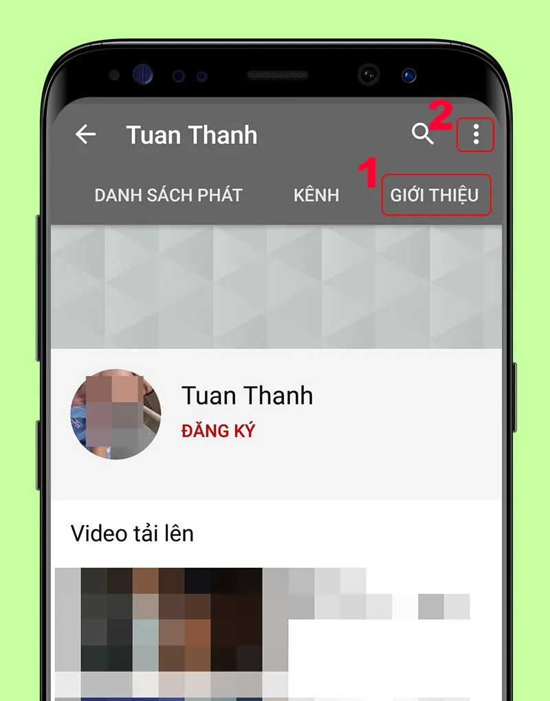 Thao tác mở mục Giới thiệu và chọn biểu tượng ba chấm trên ứng dụng YouTube di động