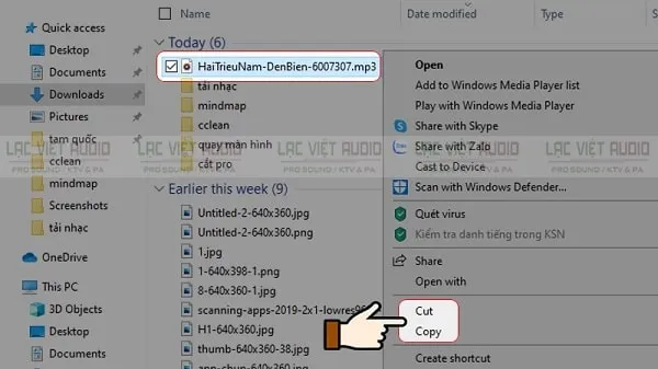 Thực hiện thao tác sao chép (Copy) hoặc cắt (Cut) file nhạc từ thư mục tải về