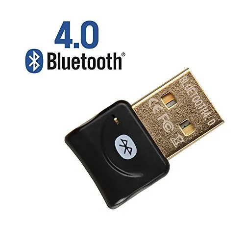 alt: Thiết bị USB phát Bluetooth cắm vào máy tính, giải pháp kết nối không dây cho máy tính bàn
