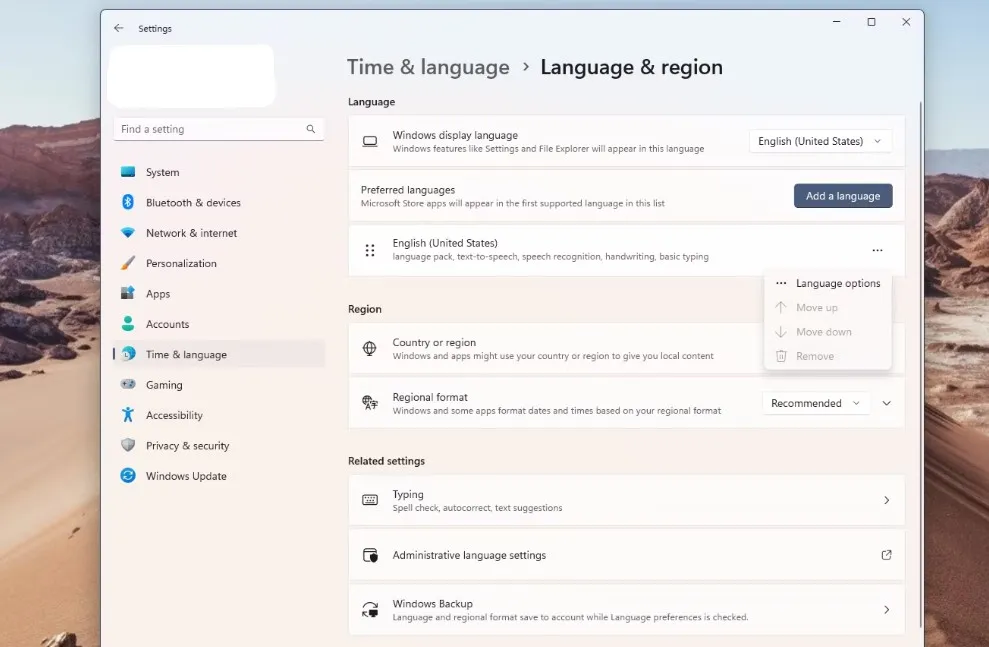 Hướng dẫn chi tiết bước 1 trong cách chỉnh bàn phím máy tính: Chọn cài đặt Ngôn ngữ &amp; Khu vực Windows 11