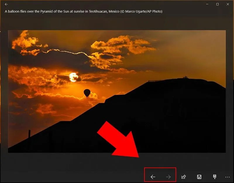 Sử dụng mũi tên để xem trước và thay đổi hình nền tự động từ Dynamic Theme
