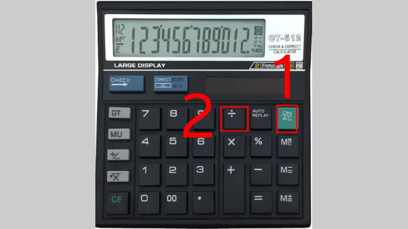 Thao tác tắt máy tính bỏ túi Citizen bằng tổ hợp phím ON và chia