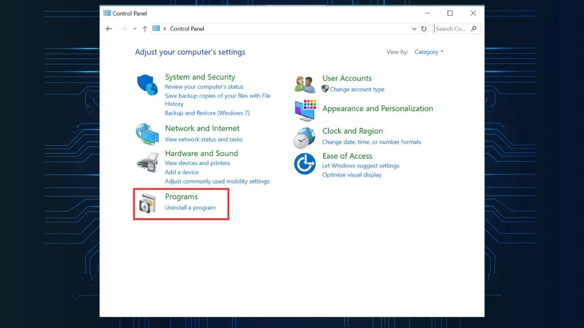 Vào Programs and Features trong Control Panel