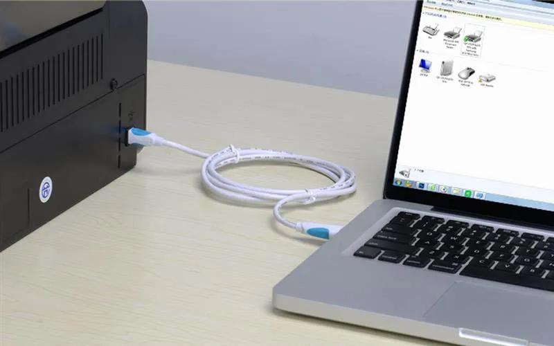 Kết nối máy in với MacBook bằng cáp USB sau khi cài đặt